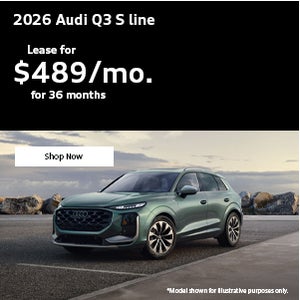 Back view of an Audi Q3 accelerating.