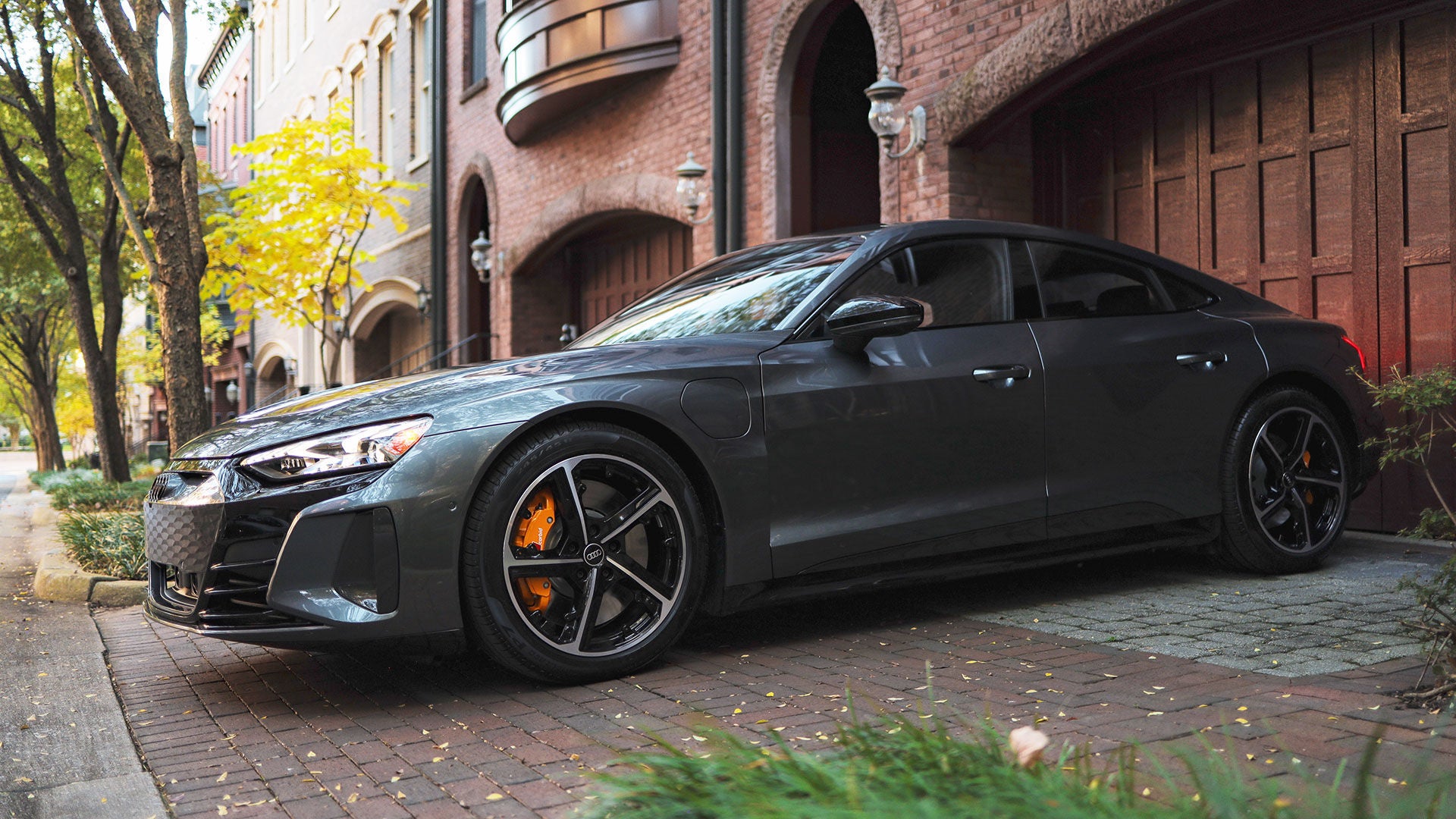 Three quarter view of an Audi vehicle parked.
