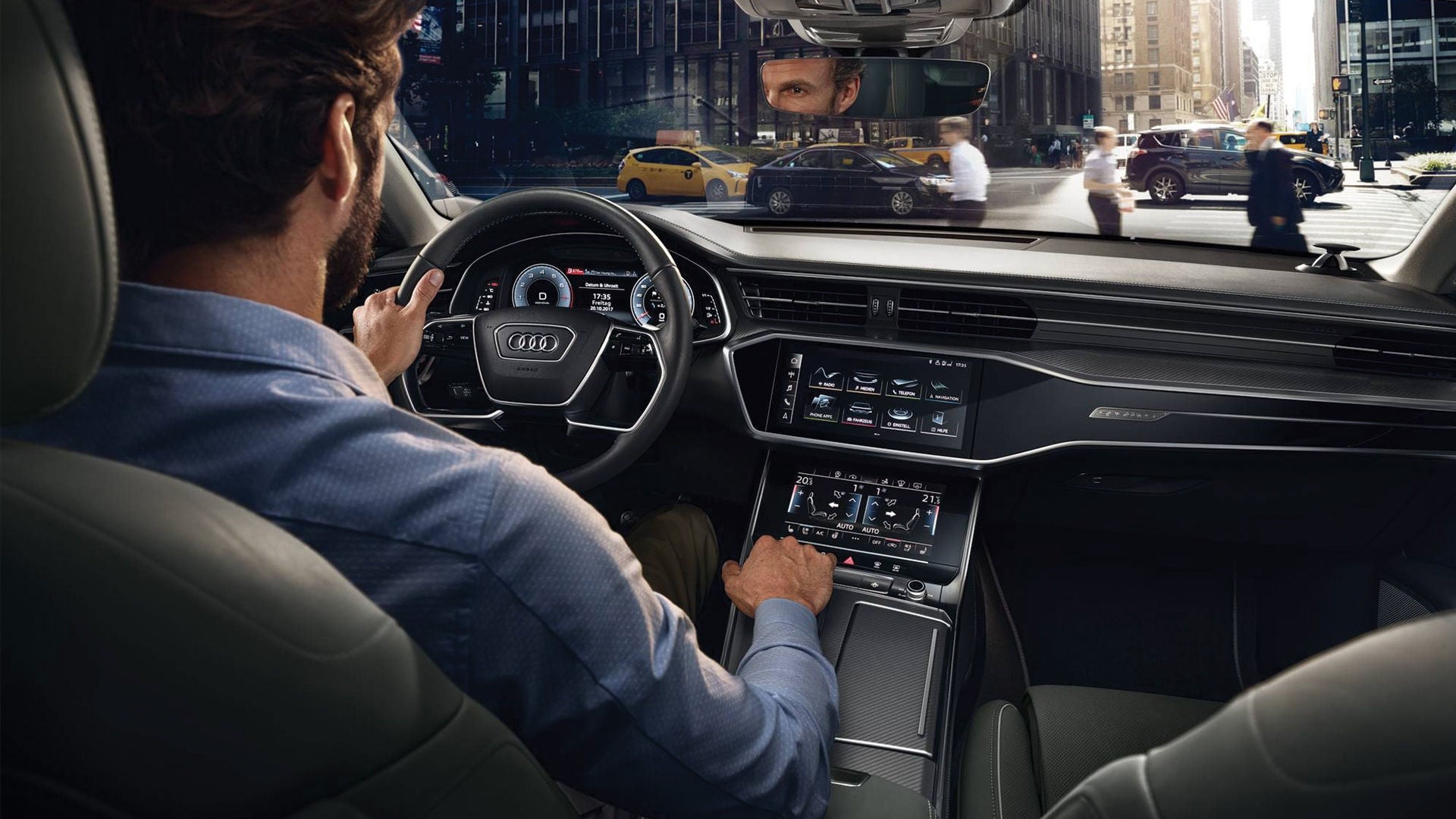  Interior view of the dual screen MMI touch response system and Audi virtual cockpit.