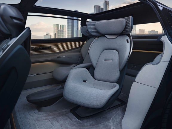 Interior view, in the center the rear left seat - slightly turned towards the door.