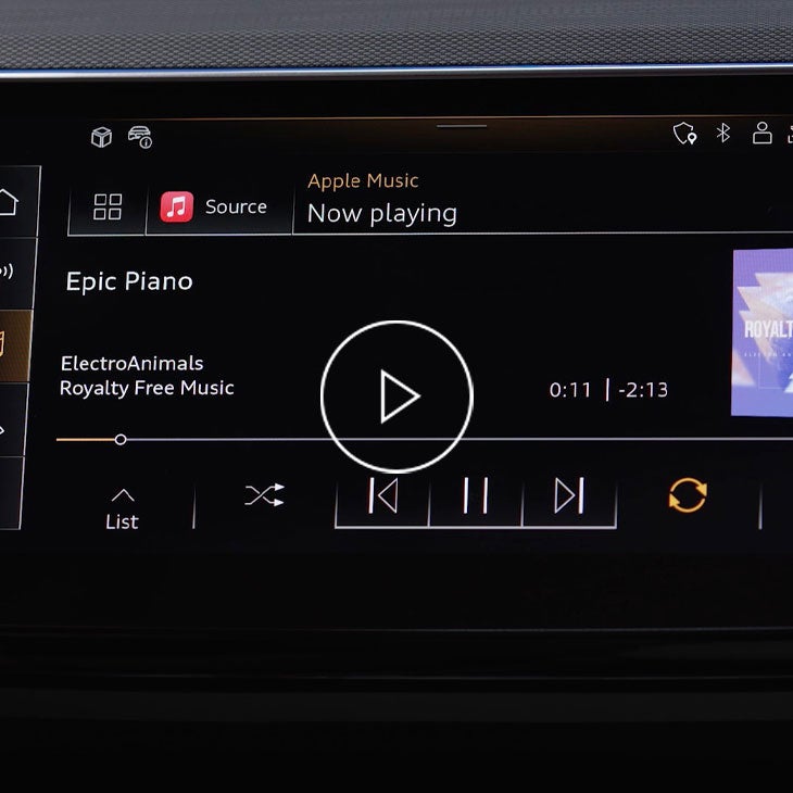 Close up on the Audi MMI displaying the Apple CarPlay feature.