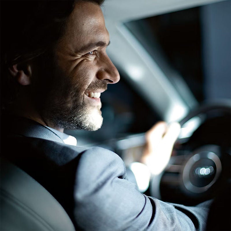 image of man in an audi 