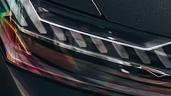 Close-up view of a headlight.