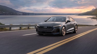 3/4 front view of the Audi A5 in motion.