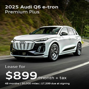front facing 2025 Audi Q6 e-tron driving